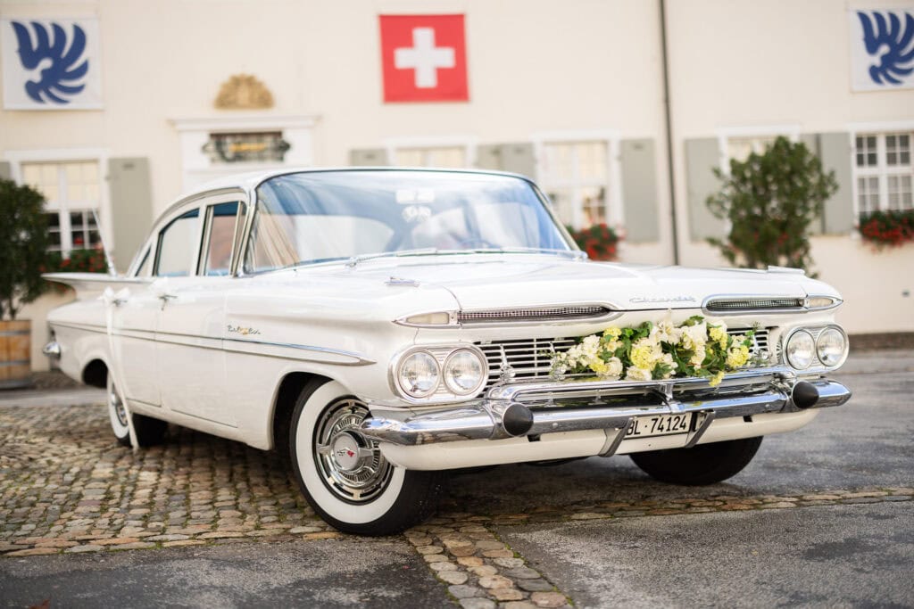 Villa Wenkenhof, Basel. Ceremony in Arlesheim church. Oldtimer with bride and groom