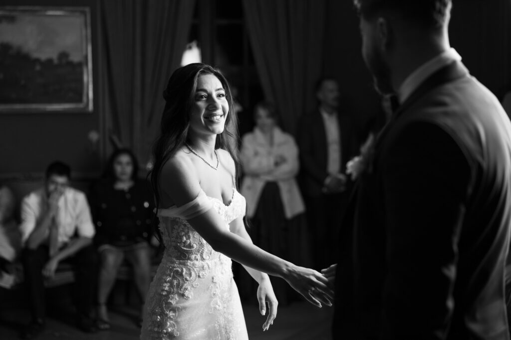 Bride dancing and celebrating during the wedding party at Villa Wenkenhof in Basel.