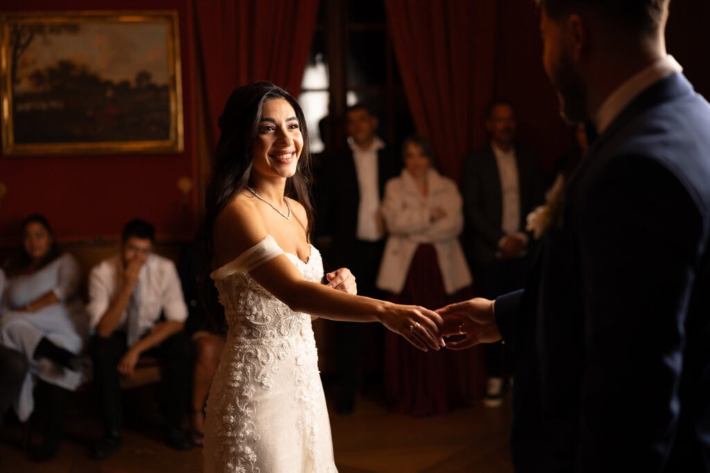 Bride dancing and celebrating during the wedding party at Villa Wenkenhof in Basel.