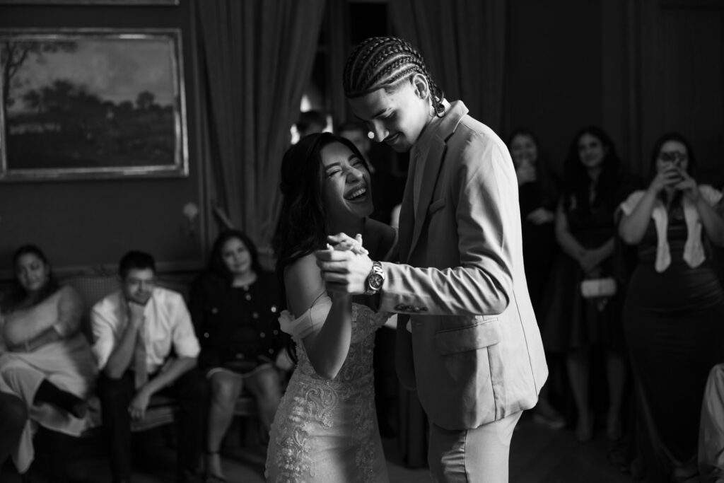 Bride dancing and celebrating during the wedding party at Villa Wenkenhof in Basel.