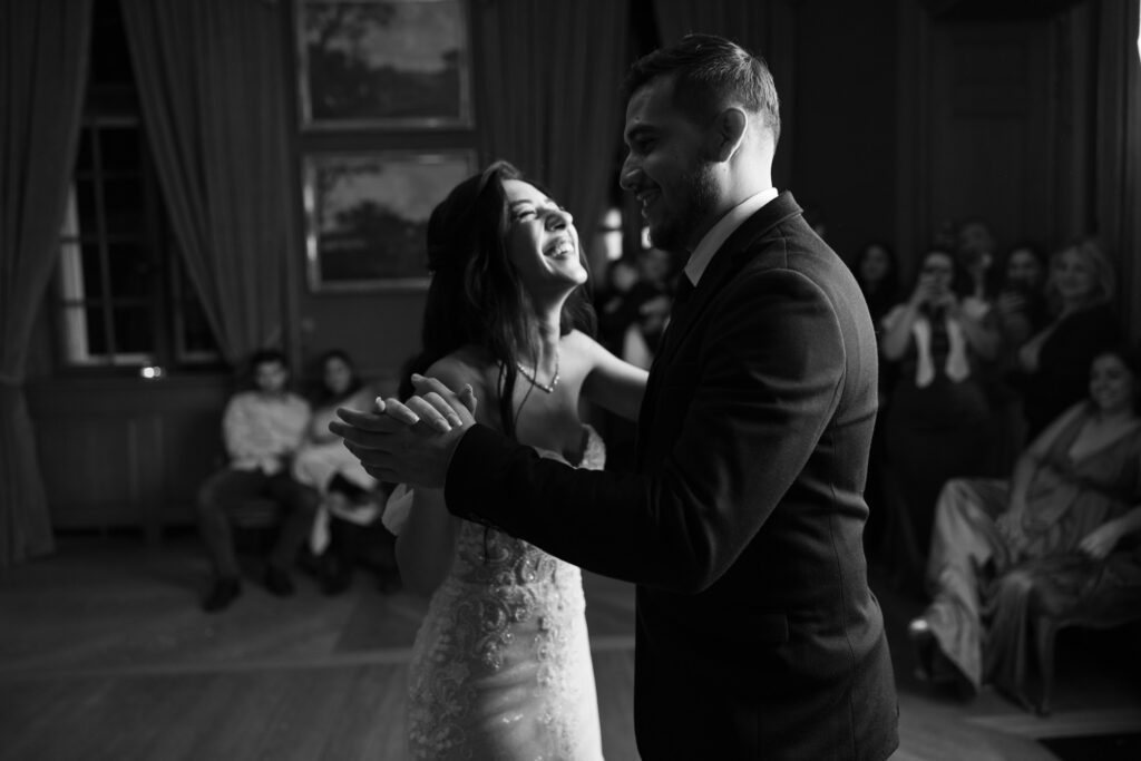 Bride dancing and celebrating during the wedding party at Villa Wenkenhof in Basel.