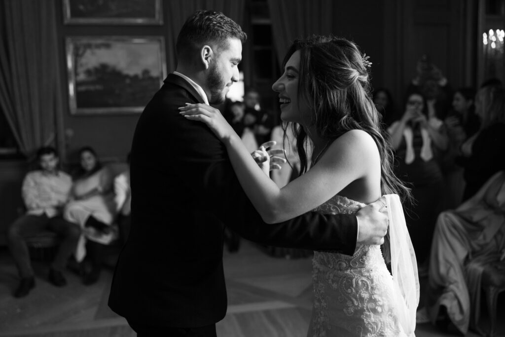 Bride dancing and celebrating during the wedding party at Villa Wenkenhof in Basel.