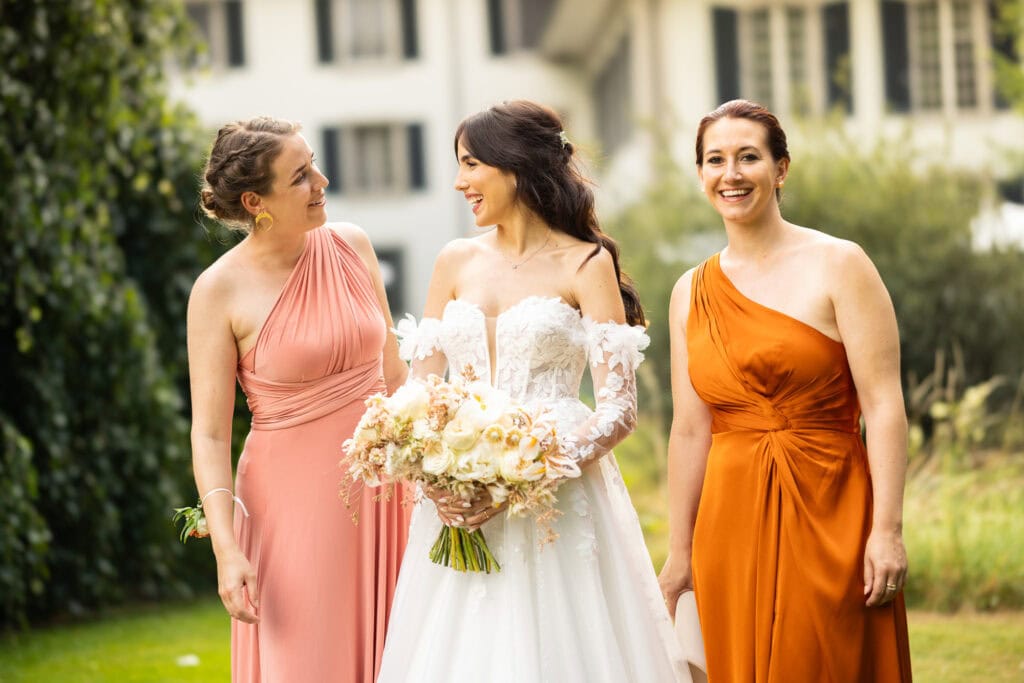 Bridemaids with the bride after the ceremony during their wedding at Schloss Hünigen in Bern
