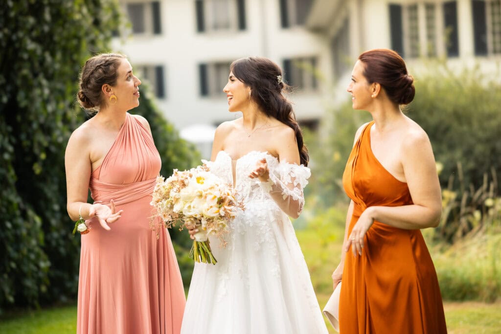Bridemaids with the bride after the ceremony during their wedding at Schloss Hünigen in Bern