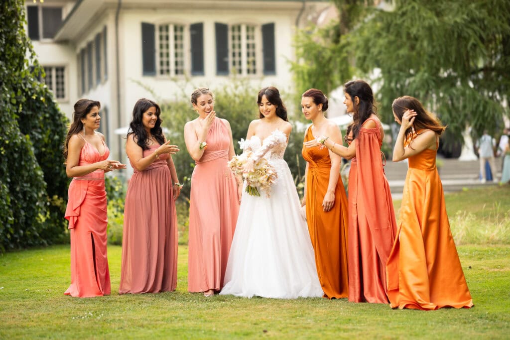Bridemaids with the bride after the ceremony during their wedding at Schloss Hünigen in Bern