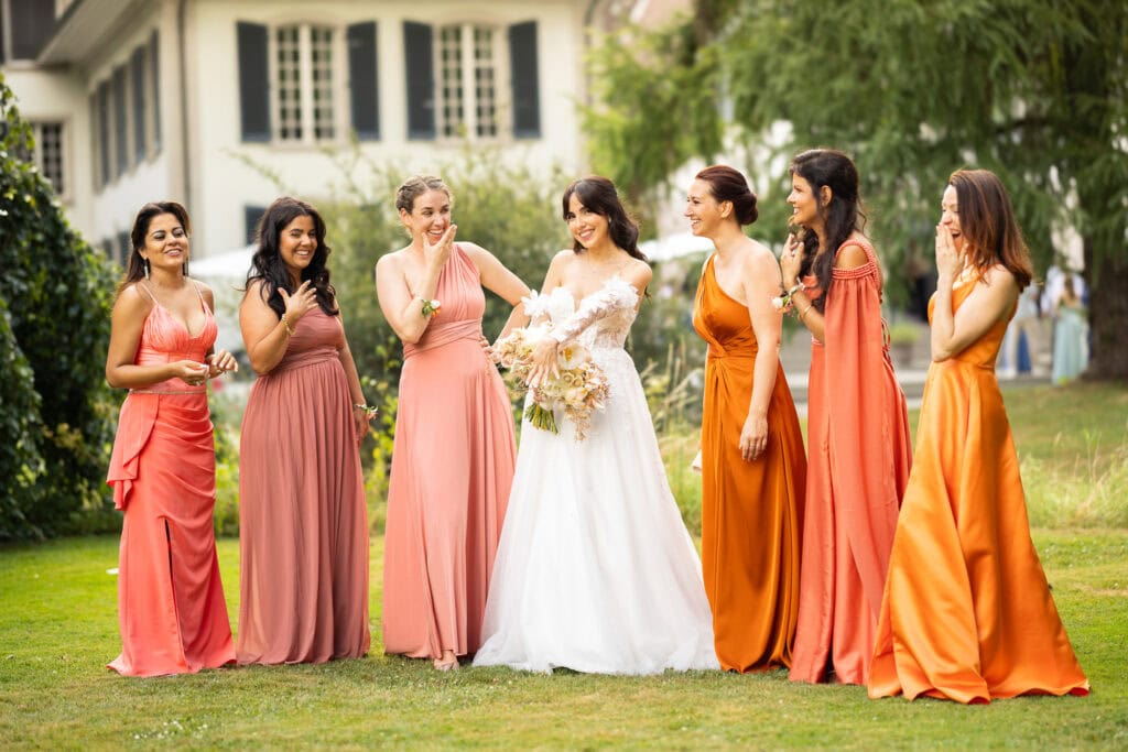 Bridemaids with the bride after the ceremony during their wedding at Schloss Hünigen in Bern