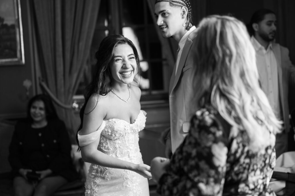 Bride dancing and celebrating during the wedding party at Villa Wenkenhof in Basel.