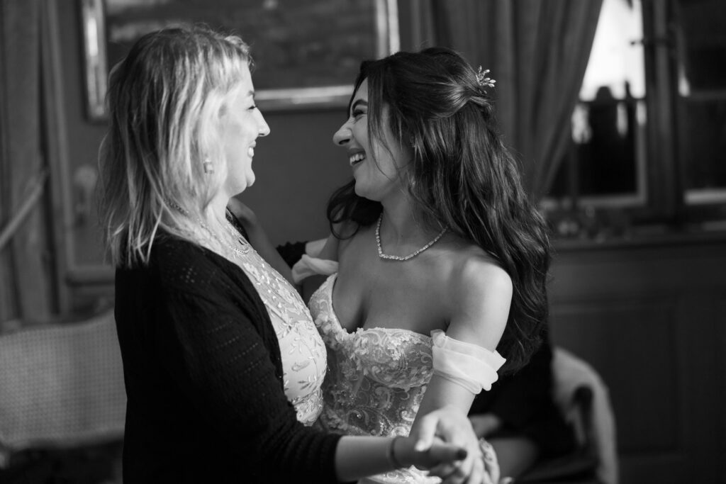 Bride dancing and celebrating during the wedding party at Villa Wenkenhof in Basel.
