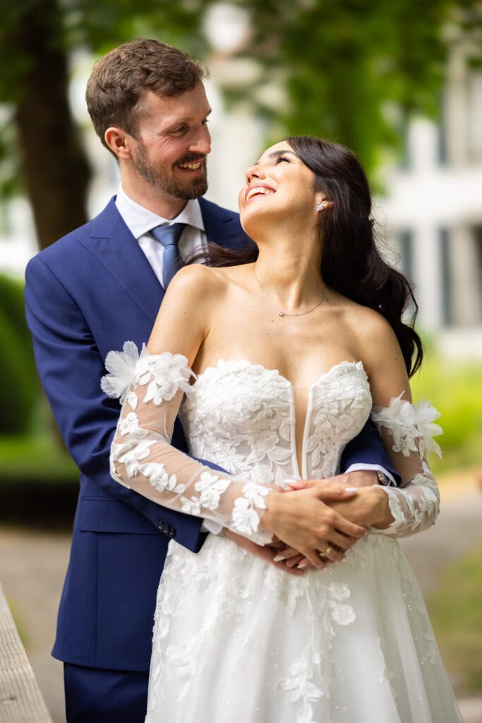 Couple session with the bride and groom in the gardens during their wedding at Schloss Hünigen in Bern