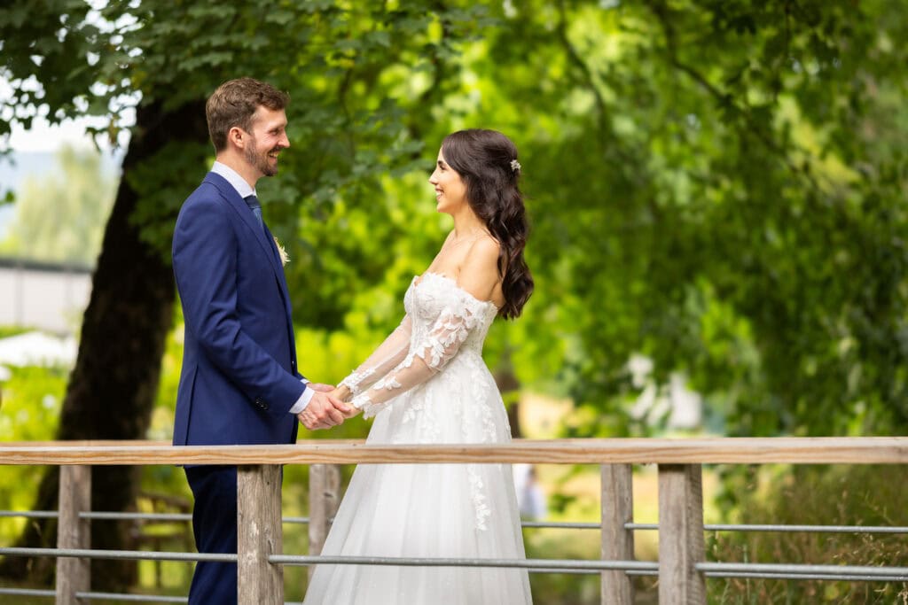 Couple session with the bride and groom in the gardens during their wedding at Schloss Hünigen in Bern