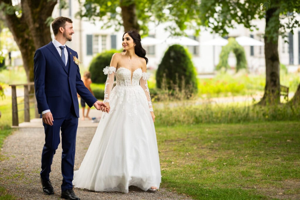 Couple session with the bride and groom in the gardens during their wedding at Schloss Hünigen in Bern