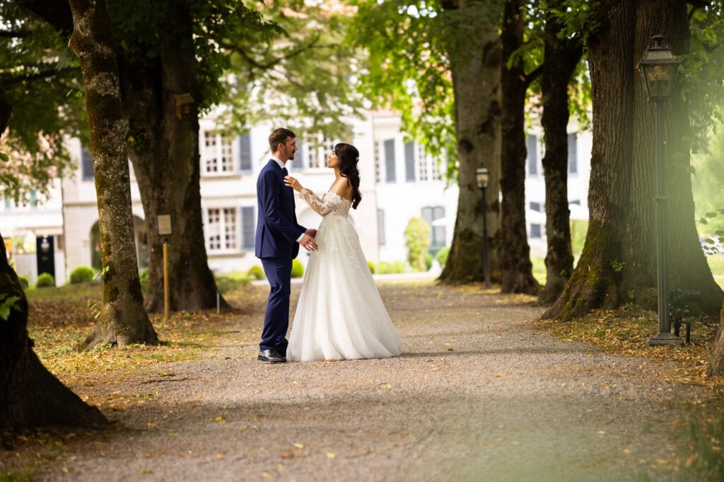 Couple session with the bride and groom in the gardens during their wedding at Schloss Hünigen in Bern