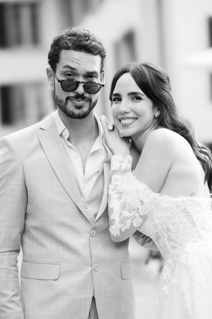 Wedding ceremony in the garden. Schloss Hünigen. Emotional and colorful wedding ceremony. Emotional hugs with family and friends after the wedding ceremony. Bride with her brother