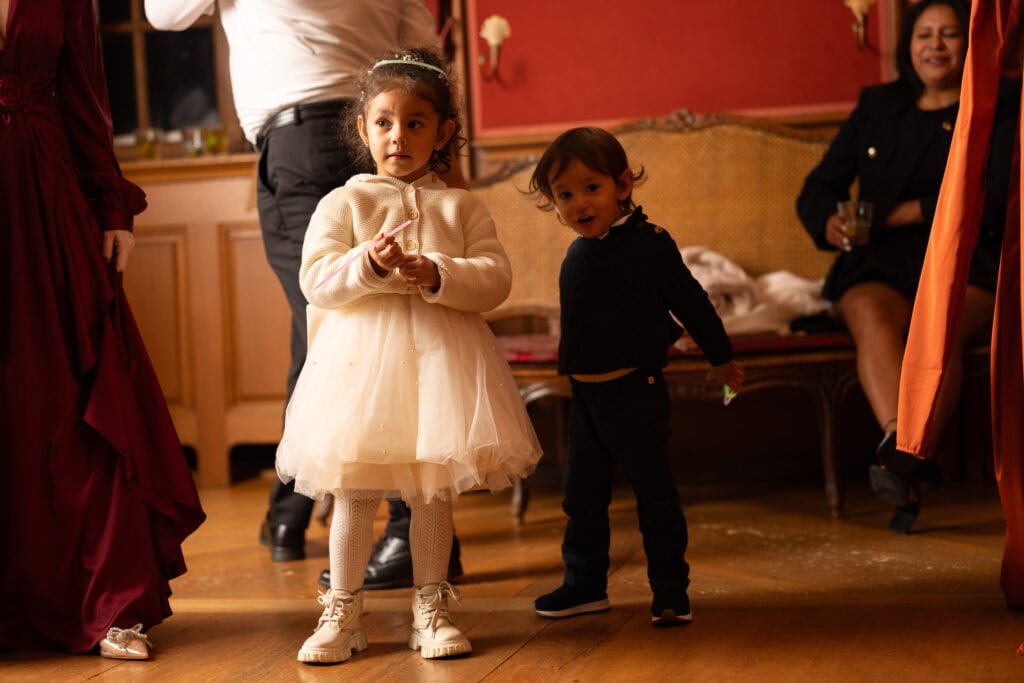 Kids playing and celebrating during the wedding party at Villa Wenkenhof in Basel.