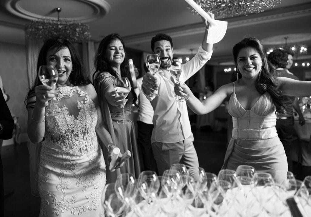 Guests dancing and celebrating during the wedding party at Schloss Hünigen in Bern