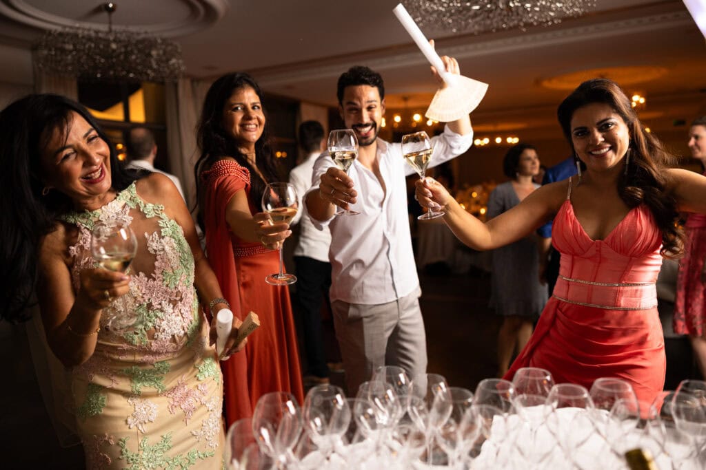 Guests dancing and celebrating during the wedding party at Schloss Hünigen in Bern