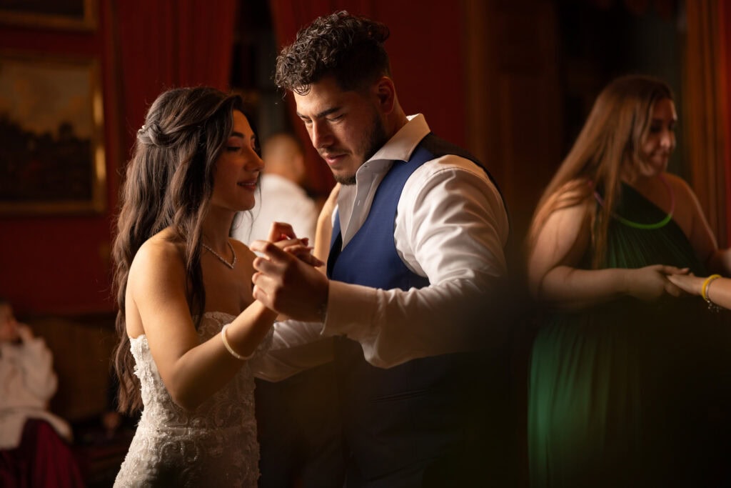 Bride and groom dancing and celebrating during the wedding party at Villa Wenkenhof in Basel.