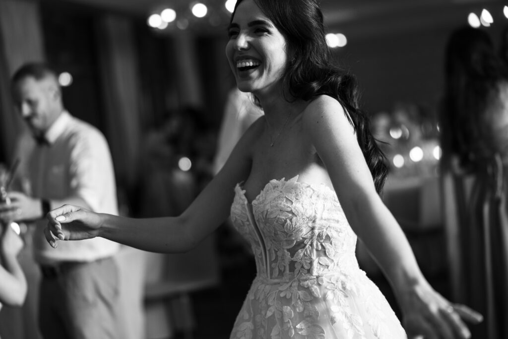 Bride and groom dancing and celebrating during the wedding party at Schloss Hünigen in Bern