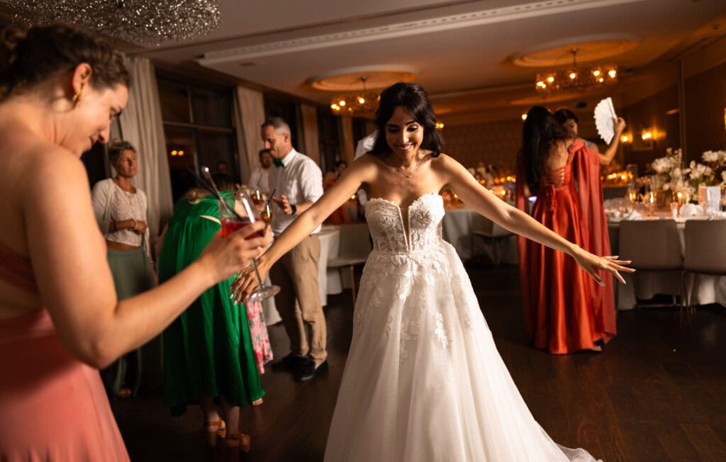 Bride and groom dancing and celebrating during the wedding party at Schloss Hünigen in Bern