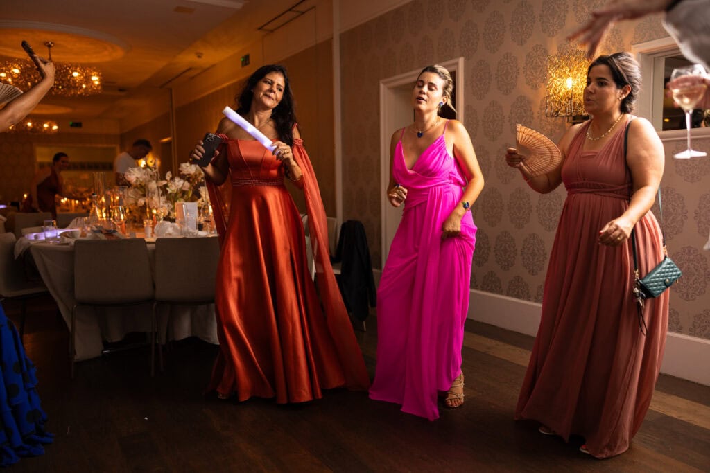 Guests dancing and celebrating during the wedding party at Schloss Hünigen in Bern