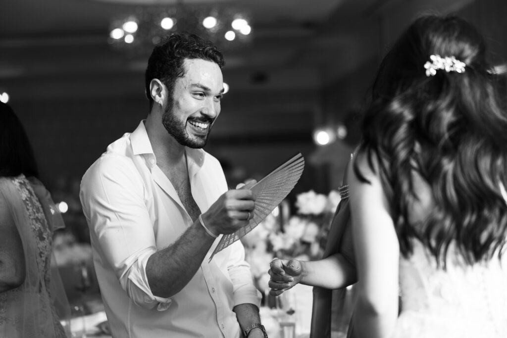 Guests dancing and celebrating during the wedding party at Schloss Hünigen in Bern