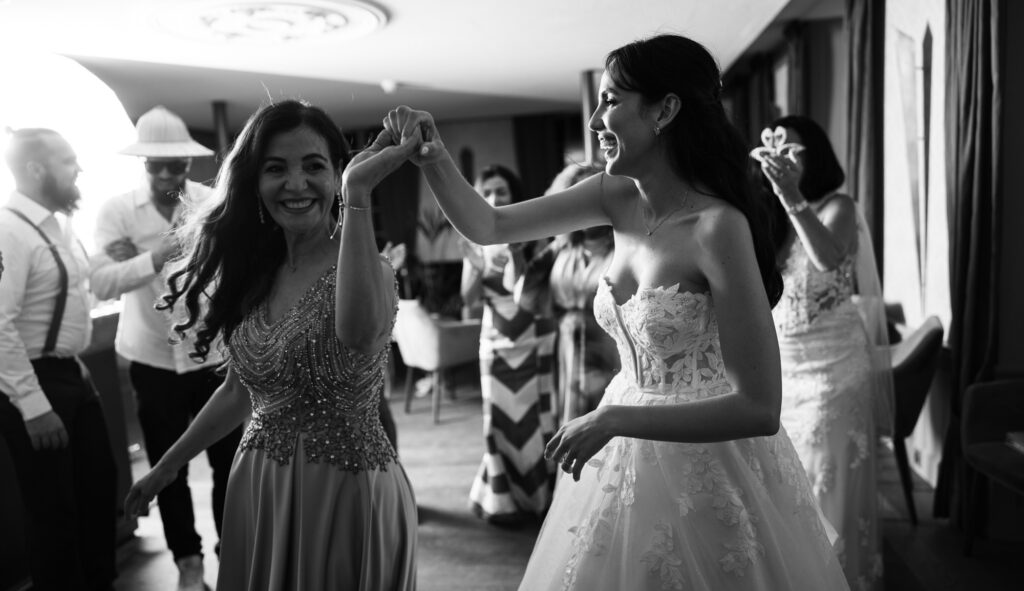 Bride and groom dancing and celebrating during the wedding party at Schloss Hünigen in Bern