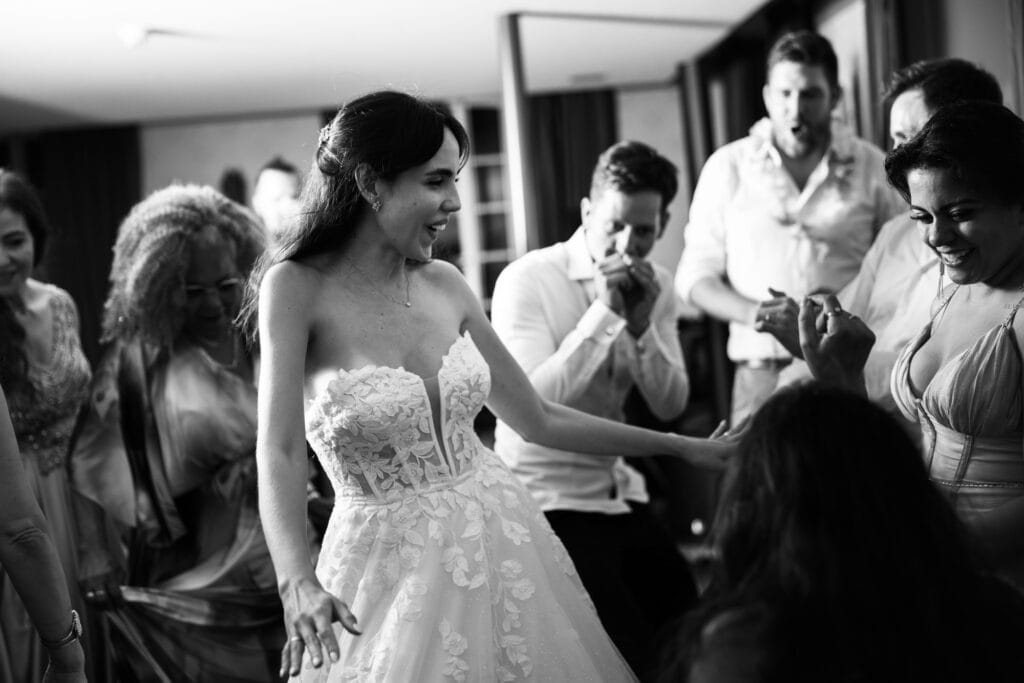 Bride and groom dancing and celebrating during the wedding party at Schloss Hünigen in Bern