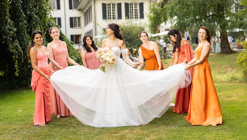 Bridemaids with the bride after the ceremony during their wedding at Schloss Hünigen in Bern