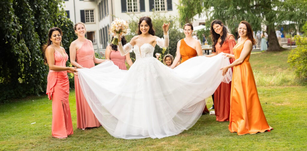 Bridemaids with the bride after the ceremony during their wedding at Schloss Hünigen in Bern
