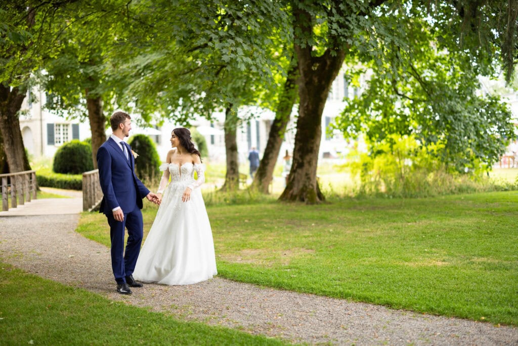 Couple session with the bride and groom in the gardens during their wedding at Schloss Hünigen in Bern