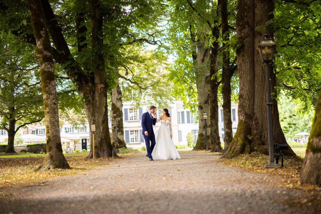 Couple session with the bride and groom in the gardens during their wedding at Schloss Hünigen in Bern