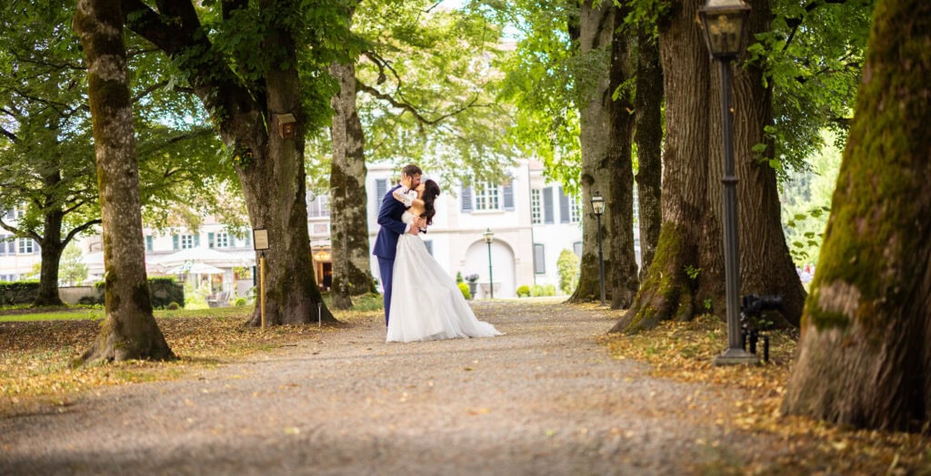 Couple session with the bride and groom in the gardens during their wedding at Schloss Hünigen in Bern