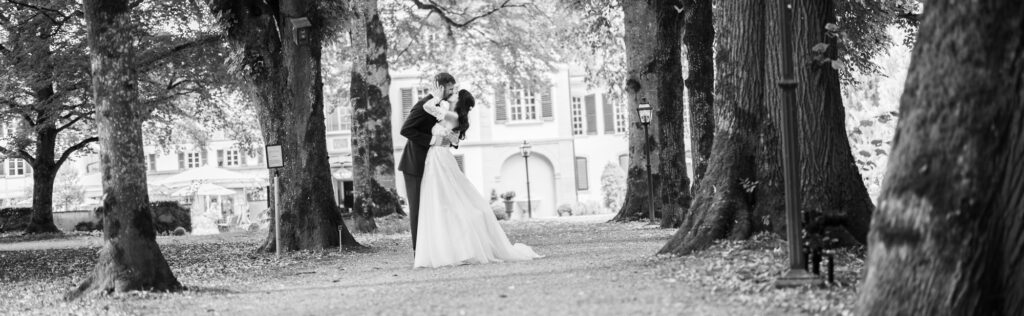 Couple session with the bride and groom in the gardens during their wedding at Schloss Hünigen in Bern