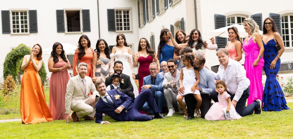 Group photo after the ceremony during their wedding at Schloss Hünigen in Bern
