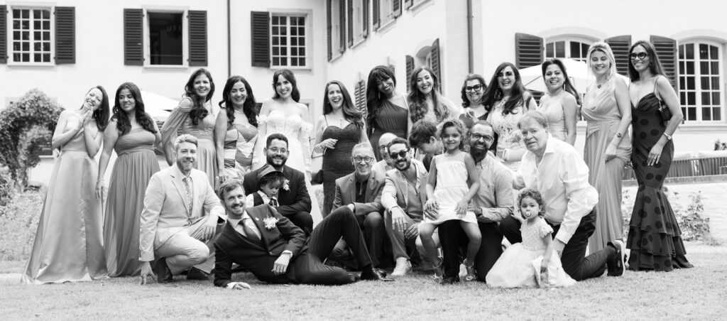 Group photo after the ceremony during their wedding at Schloss Hünigen in Bern