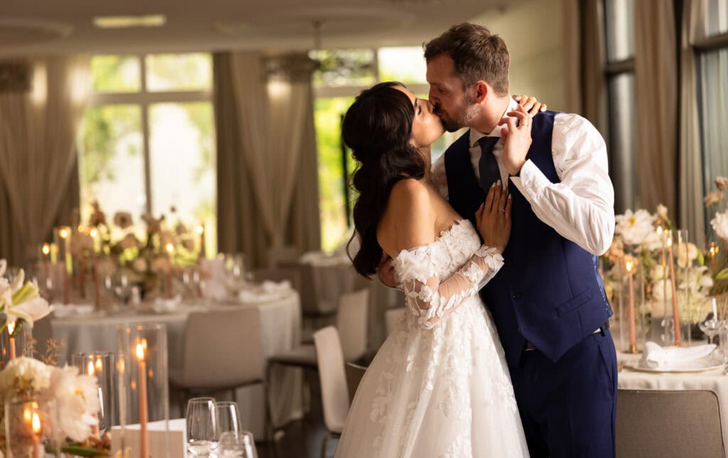 Couple session with the bride and groom in the gardens during their wedding at Schloss Hünigen in Bern