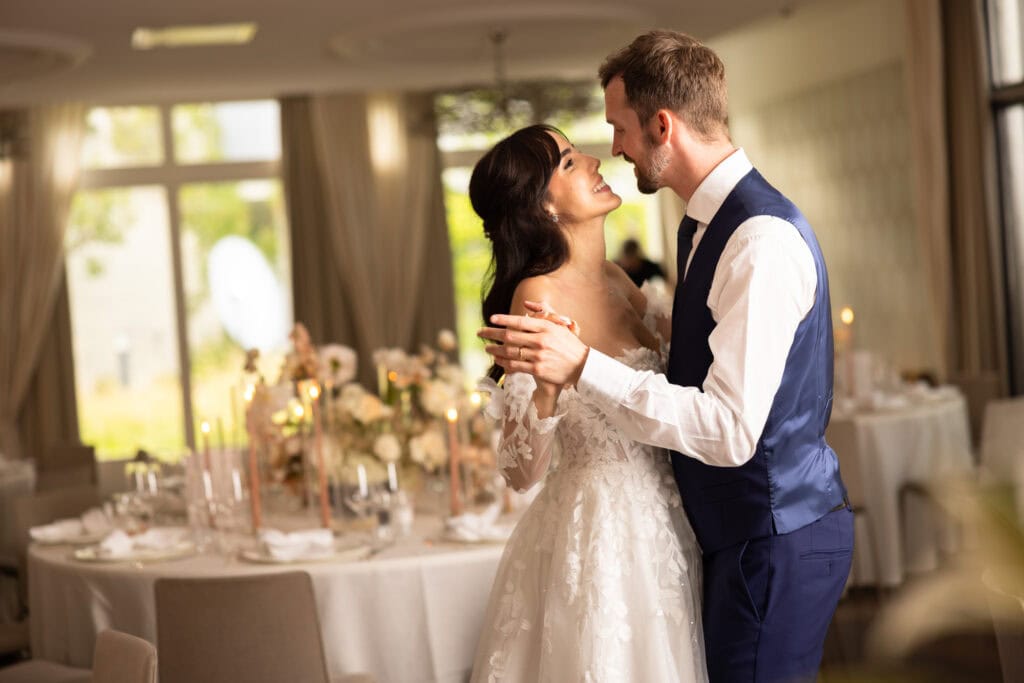 Couple session with the bride and groom in the gardens during their wedding at Schloss Hünigen in Bern