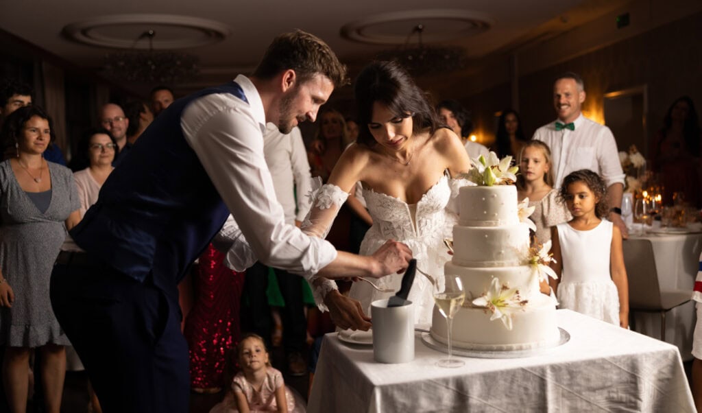 Wedding cake displayed during the reception at Schloss Hünigen in Bern