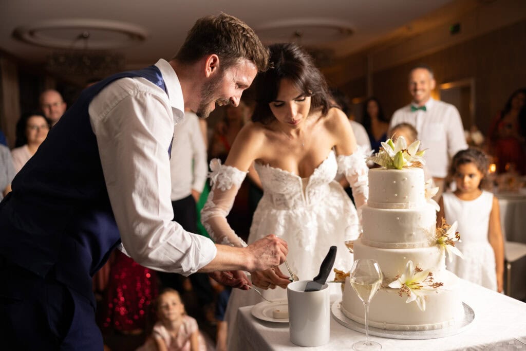 Wedding cake displayed during the reception at Schloss Hünigen in Bern