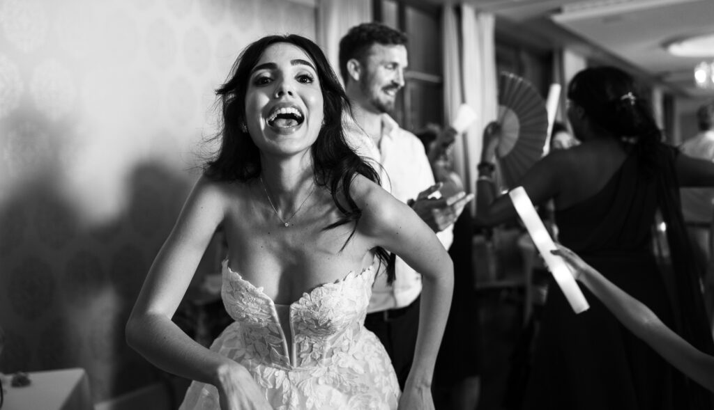 Bride and groom dancing and celebrating during the wedding party at Schloss Hünigen in Bern