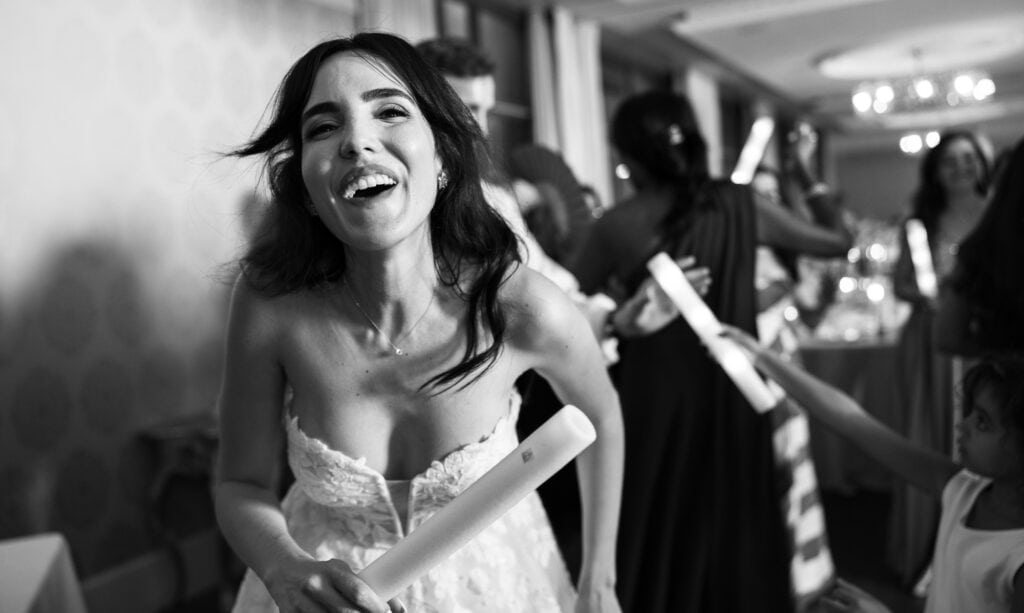 Bride and groom dancing and celebrating during the wedding party at Schloss Hünigen in Bern