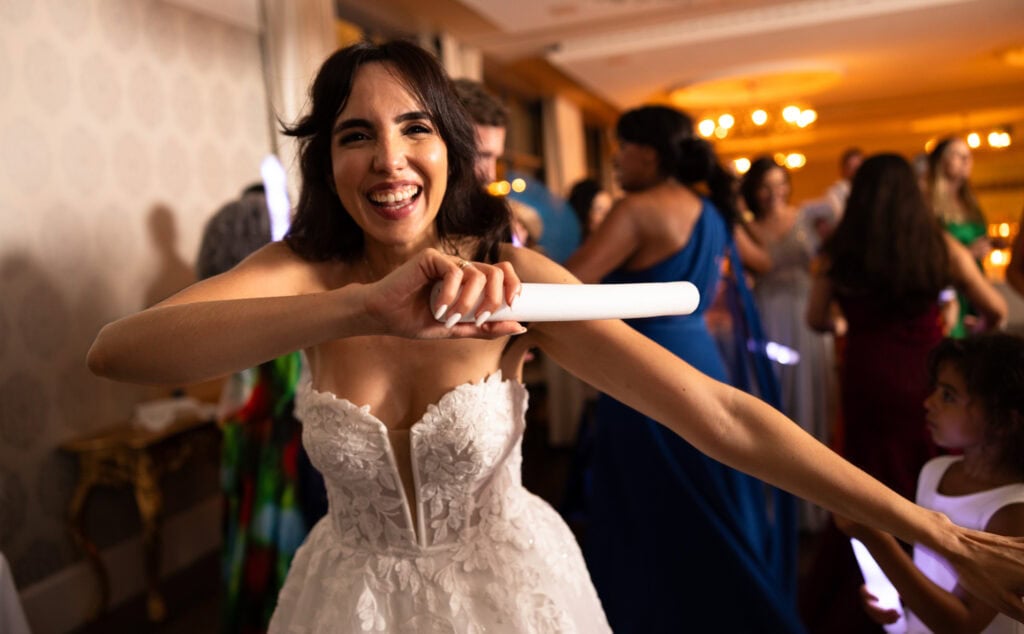 Bride and groom dancing and celebrating during the wedding party at Schloss Hünigen in Bern