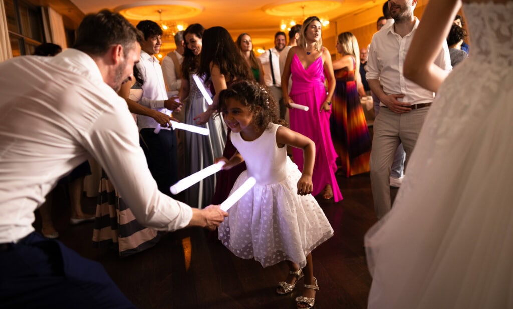 Guests dancing and celebrating during the wedding party at Schloss Hünigen in Bern