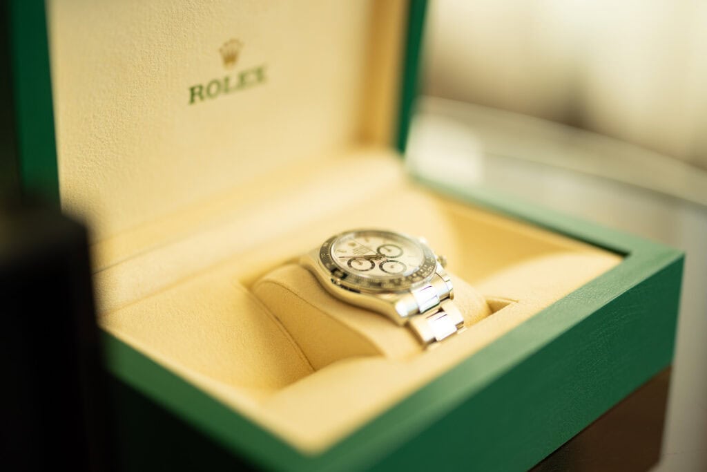 Wedding at Grand Hotel Dolder, Zürich. Getting ready with groom. Rolex